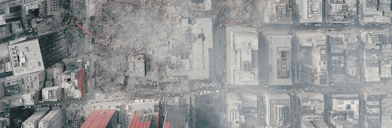 An aerial view of Ground Zero and the toxic dust cloud