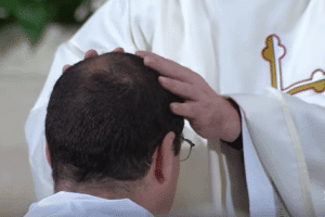 Lawsuit Accuses Priest