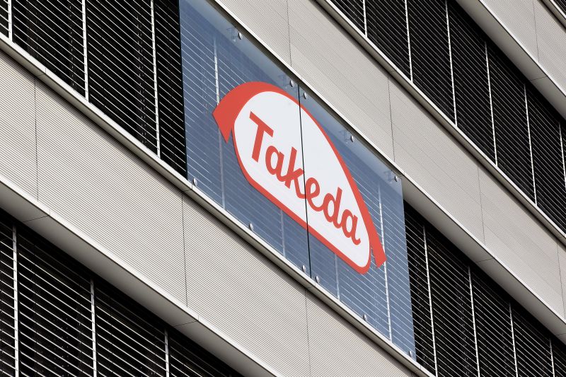 The logo of Japanese Takeda Pharmaceutical Co is seen at an office building in Glattbrugg