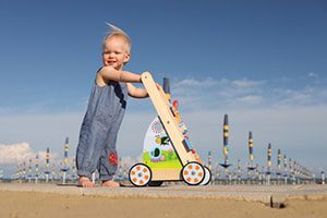 B. toys walk ‘n’ learn wooden activity toddler walker lawsuits