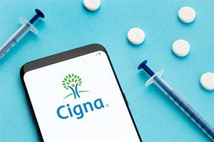 Cigna denies medically necessary claims without reviewing patient files